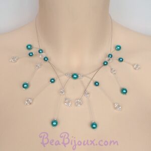 Collier de mariée CO1215A sur plusieurs rangs de fils câblés argentés, perles nacrées turquoise et cristaux.