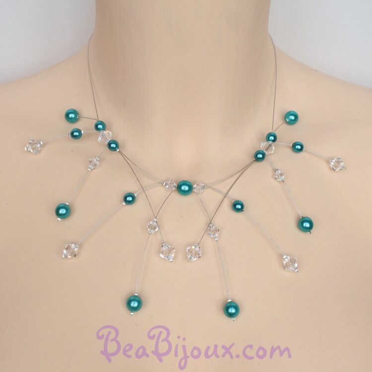 Collier de mariée CO1215A sur plusieurs rangs de fils câblés argentés, perles nacrées turquoise et cristaux.
