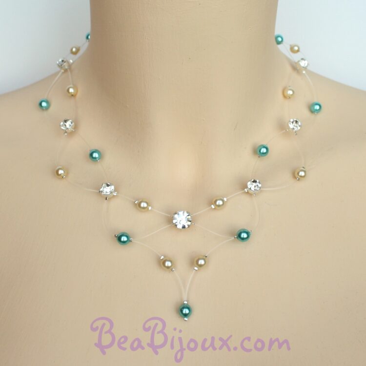 Collier de mariée CO1214A sur fil nylon transparent avec strass brillants et perles nacrées turquoise et ivoire foncé.