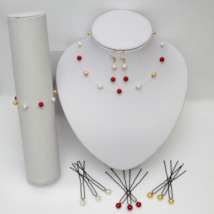 Parure de mariage personnalisée en perles de verre nacrées rouge, ivoire et or sur fil nylon transparent.